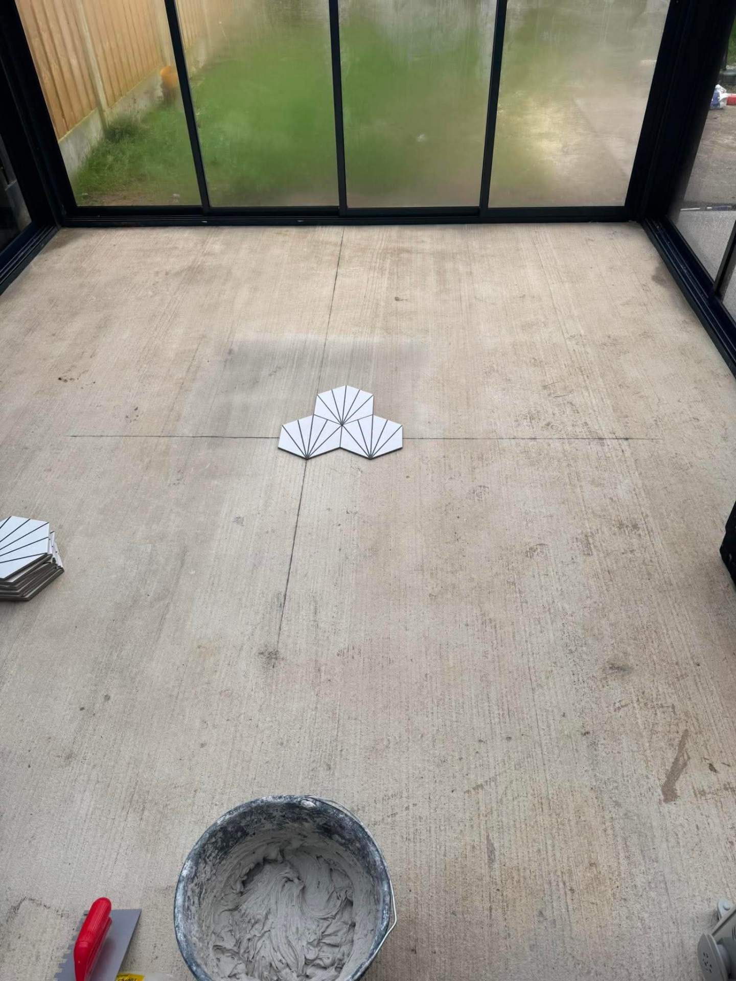 Bathroom floor finished — mop in shot