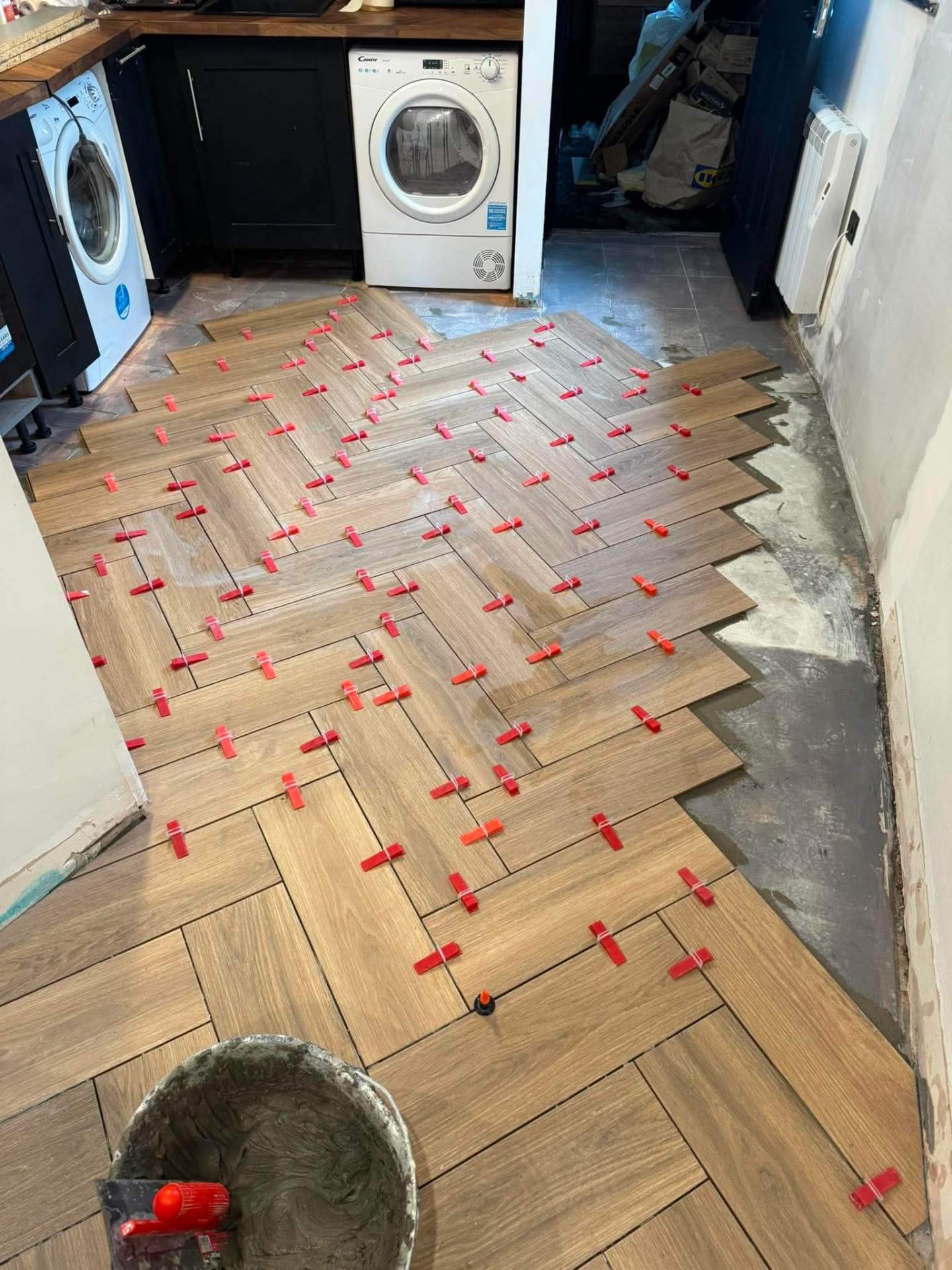 Herringbone install — utility room and appliances